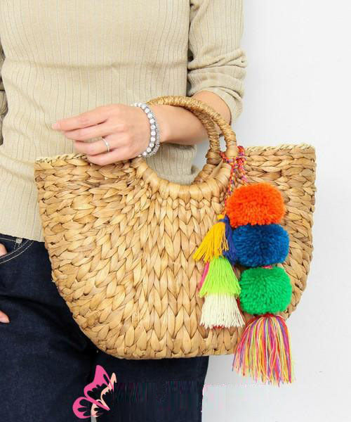 2022 New Corn Husk Braided Fringed Fur Ball Bag Women's Summer Straw Bag Holiday Bag