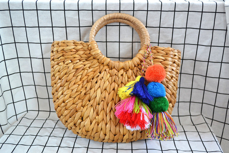 2022 New Corn Husk Braided Fringed Fur Ball Bag Women's Summer Straw Bag Holiday Bag